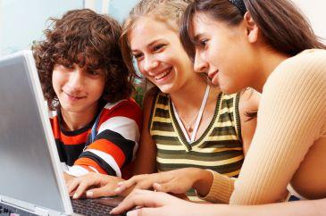 teens looking at computer screen in McCrae, Victoria