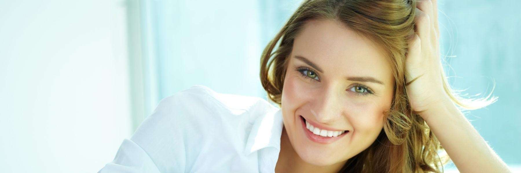 woman with dental crowns in mccrae