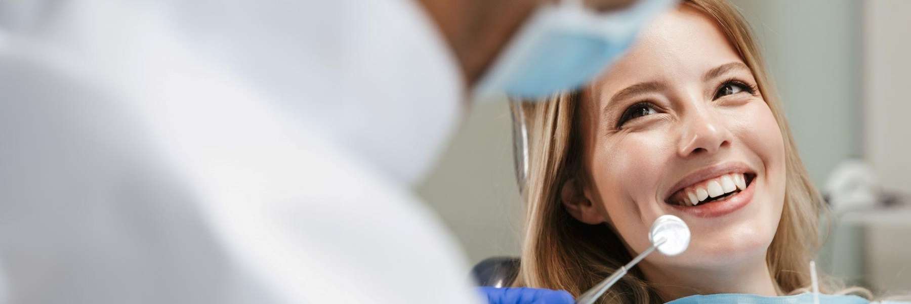 woman at dentist for whitening in mccrae