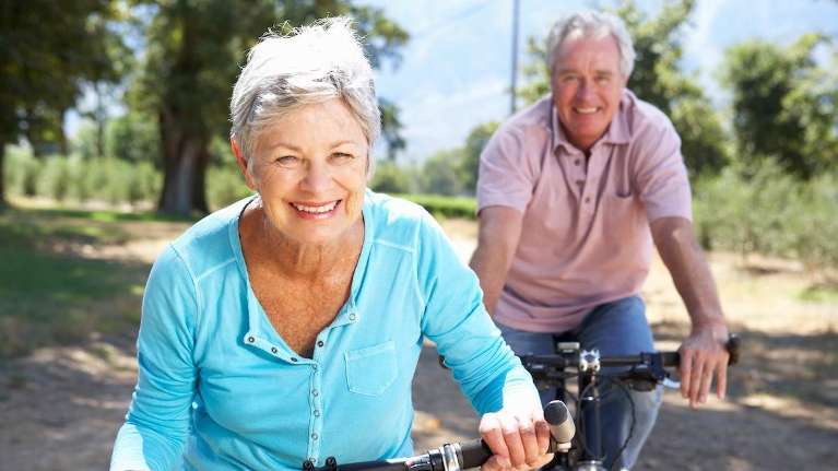 couple riding their bikes at a park near McCrae, VIC