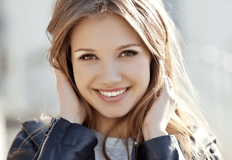 smile makeovers mccrae | woman smiling