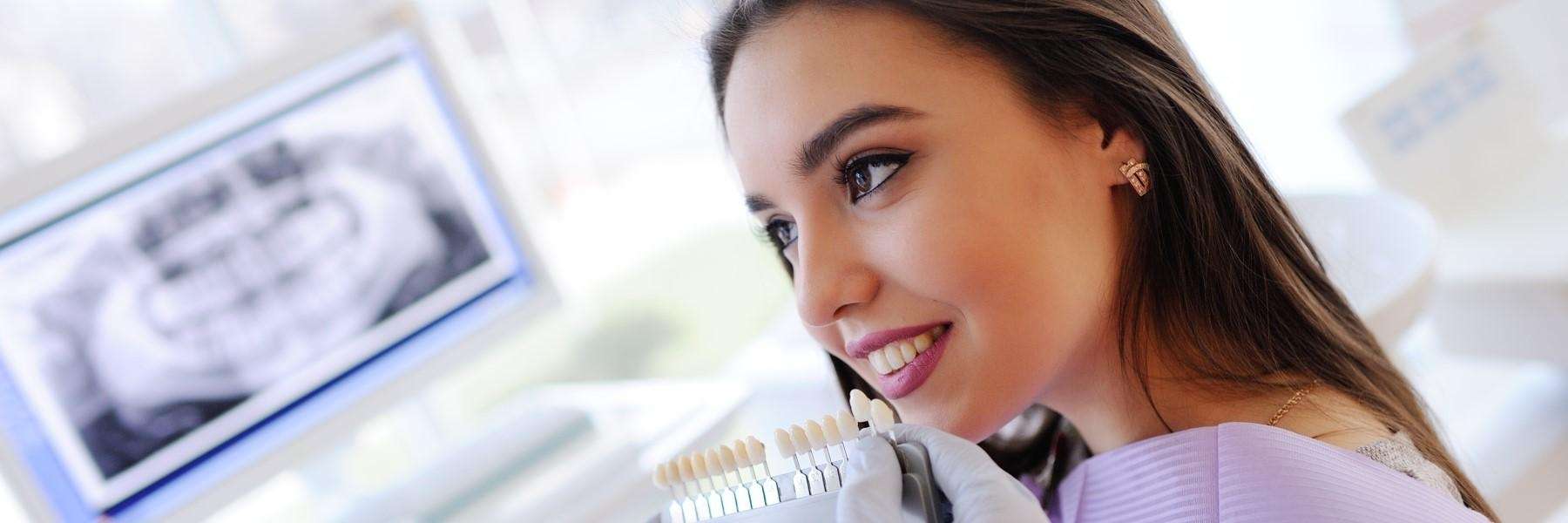cosmetic dentistry mccrae | woman at dentist
