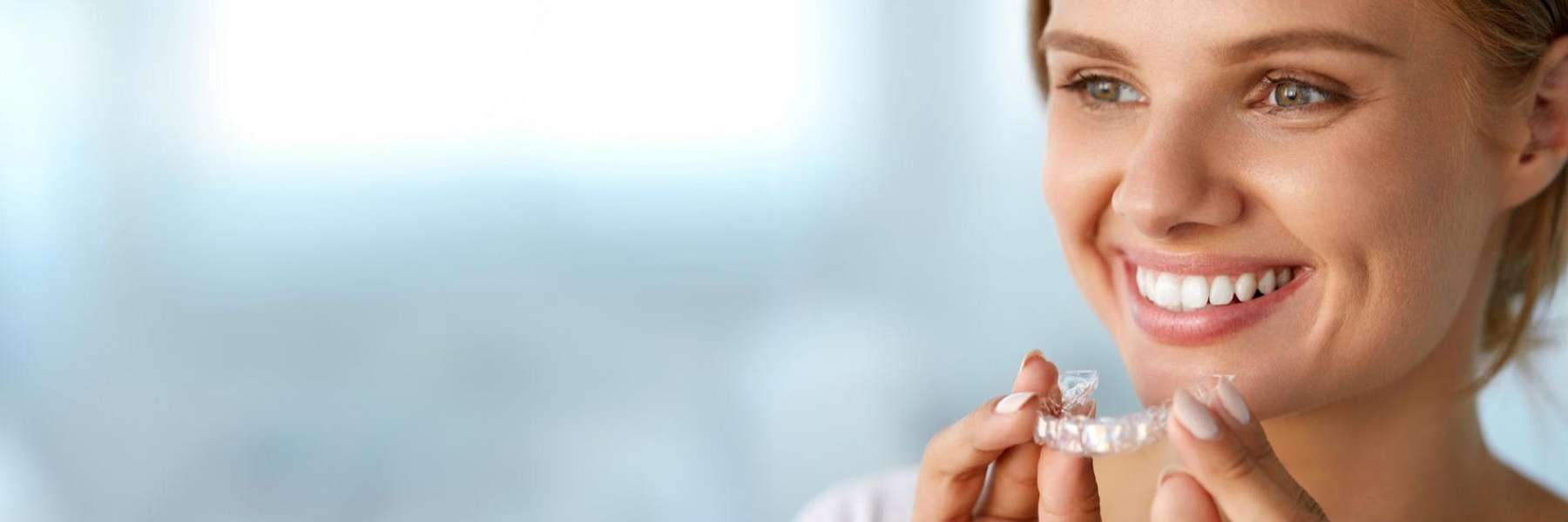 woman with clear aligners in McCrae