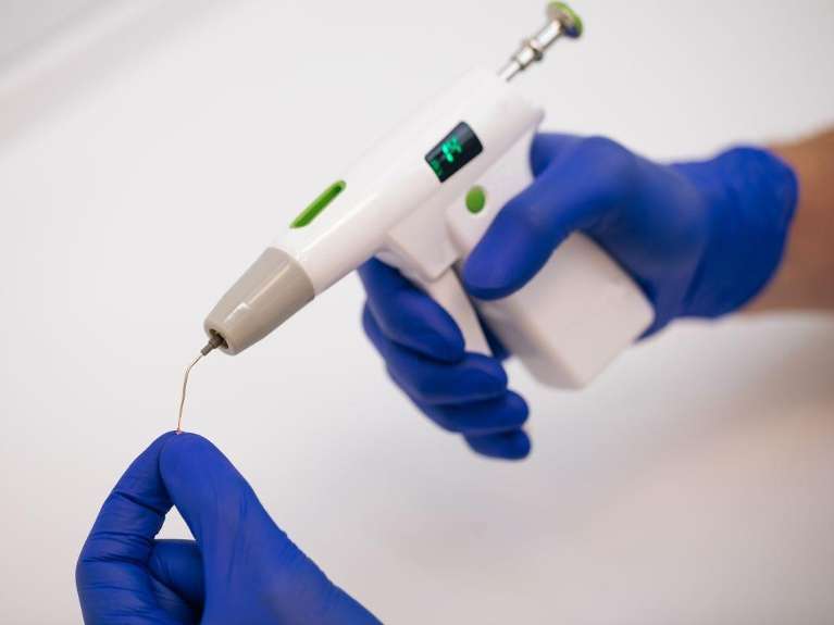 dentist getting ready to do a root canal in mccrae