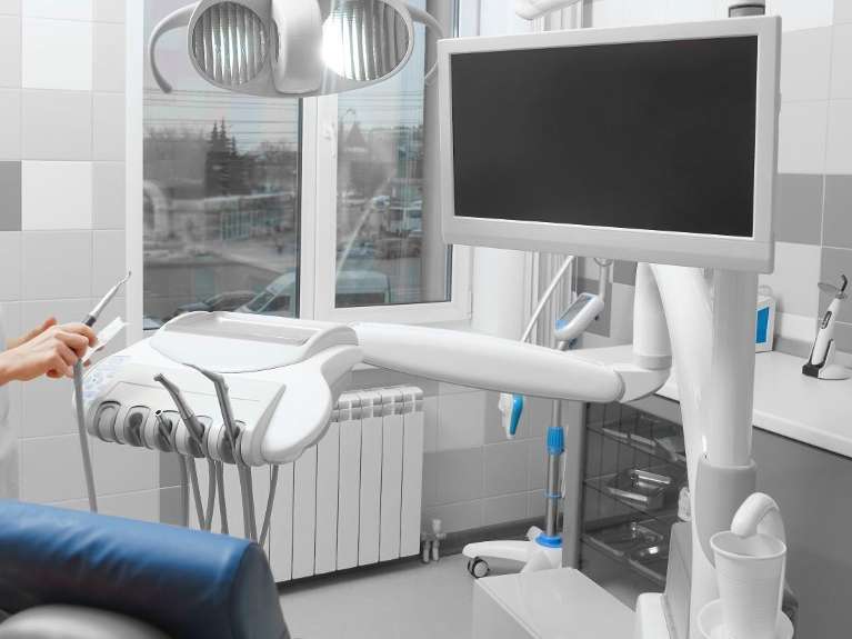 exam room with TV at dental office in mccrae